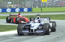 Ralf Schumacher giver her baghjul til Ferrari